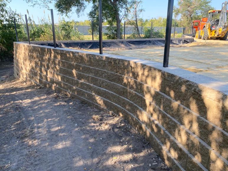 Segmental retaining wall construction progress